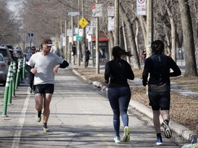 Runners enjoy the mild temperatures in Montreal on Tuesday, February 27, 2024.THE CANADIAN PRESS/Ryan Remiorz
