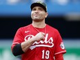 Joey Votto of the Cincinnati Reds smiles during a game against the Toronto Blue Jays in 2022.