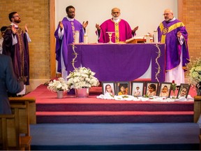 A Catholic Memorial Mass organized by the Ottawa Sri Lankan Catholic Prayer Group was held Saturday for the six victims of the Barrhaven mass killing on March 6. The service was led by, from left to right, Father Jonathan Kelly; Father Martin Okwudiba; Father Virgil Amirthakumar; and Father Pierre Champoux.