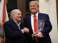 Retired professional golfer Jack Nicklaus presents Republican presidential candidate and former President Donald Trump with the 2024 Trump International Golf Club Most Improved Player award.