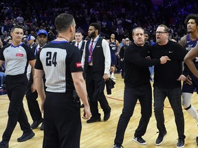 Philadelphia 76ers' Nick Nurse reacts to officials after the 76ers lost an NBA basketball game against the Los Angeles Clippers.