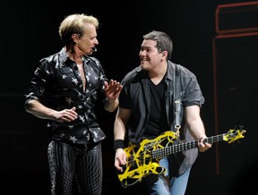 Singer David Lee Roth and Wolfgang Van Halen perform at their dress rehearsal for family and friends at the Forum on Feb. 8, 2012 in Inglewood, California.