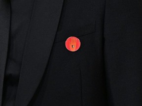 FIlm producer Nadim Cheikhrouha wears an "Artists4Ceasefire" pin as he attends the 96th Annual Academy Awards at the Dolby Theatre in Hollywood, California on March 10, 2024.