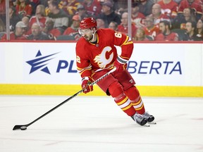 Daniil Miromanov #62 of the Calgary Flames skates against the Montreal Canadiens during the second period at the Scotiabank Saddledome on March 16, 2024, in Calgary, Alberta, Canada.
