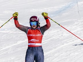 Marielle Thompson of Canada celebrates after winning the women's Ski Cross event at the FIS Ski Cross, SX, World Cup in Veysonnaz, Switzerland, Saturday, March 16, 2024.