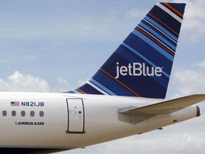 In this file photo taken April 8, 2013, a JetBlue A320 is parked at Brookley Field after a ground breaking ceremony for an assembly line for the Airbus A320 at Brookley Aeroplex in Mobile, Alabama.