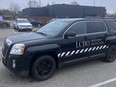 Black SUV with "LCBO Resource Protection" on side.