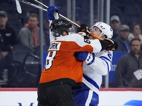Philadelphia Flyers' Cam York, left, collides with Toronto Maple Leafs' Matthew Knies during a game last week. The two team will go at it again on Tuesday night.
