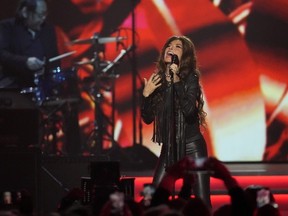 Shania Twain performs during MusiCares Person of the Year honoring Jon Bon Jovi on Friday, Feb. 2, 2024, in Los Angeles. Dua Lipa, Sza and Shania Twain lead female charge at this year's Glastonbury festival in June.