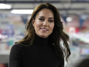 Britain's Kate, Princess of Wales, smiles during her visit to Sebby's Corner in north London, Friday, Nov. 24, 2023.