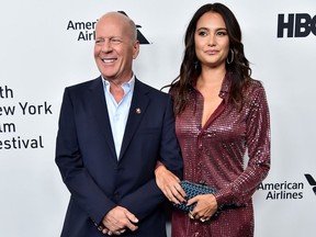 Bruce Willis and Emma Hening are pictured at the New York Film Festival on Oct. 11. 2019.