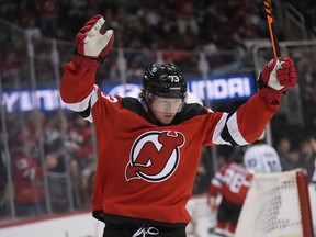 New Jersey Devils' Tyler Toffoli reacts after Jack Hughes scores during the second period of an NHL hockey game against the Seattle Kraken in Newark, N.J., Monday, Feb. 12, 2024.&ampnbsp;The Winnipeg Jets have acquired veteran winger Toffoli from the New Jersey Devils in exchange for draft picks.&ampnbsp;THE CANADIAN PRESS/AP/Seth Wenig