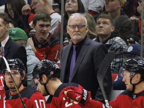 New Jersey Devils' head coach Lindy Ruff looks towards the ice during the third period of an NHL hockey game against the Carolina Hurricanes in Raleigh, N.C., Saturday, Feb. 10, 2024.