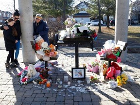 A memorial continues to grow at Palmadeo Park in Barrhaven dedicated to the six people, including four children, were found dead late Wednesday at a home a in Barrhaven. memorial Friday.