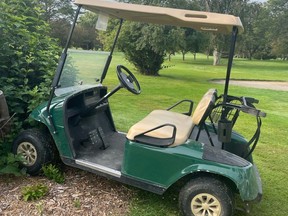 A staff member of the Belmont golf club discovered a golf cart that was driven into a bush early Tuesday, hours after thieves made off with 13 golf carts worth more than $100,000. (Submitted)