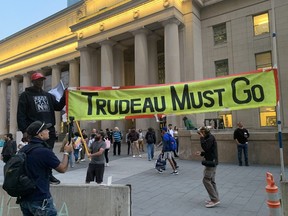 A group of anti-Trudeau protesters taunted the Prime Minister from across the street as he left the Fairmont Royal hotel with Ukraine's President Volodymyr Zelenskyy on Friday, Sept. 22, 2022.