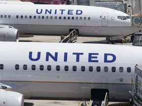 Two United Airlines Boeing 737s are parked at the gate at the Fort Lauderdale-Hollywood International Airport in Fort Lauderdale, Fla., July 7, 2022.