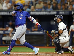 Vladimir Guerrero Jr. of the Toronto Blue Jays hits a 450-foot home run in the sixth inning against the Tampa Bay Rays at Tropicana Field in St Petersburg on Thursday.
