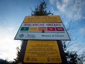 A sign showing an avalanche hazard warning of "considerable" is near McBride, B.C., on Saturday Jan. 30, 2016.