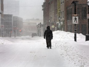 People in eastern Newfoundland are continuing to dig out from a heavy snowstorm that has lingered over parts of the province since late Thursday. Water Street in downtown St. John's was quiet on Friday, March 8, 2024 as most businesses did not open.