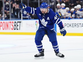Toronto Maple Leafs defenceman Morgan Rielly celebrates after an overtime win last month.