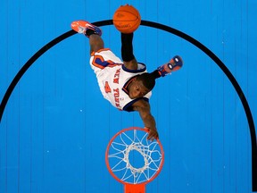 Nate Robinson of the New York Knicks attempts a dunk in the Slam Dunk Competition in 2007.