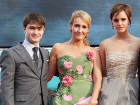 Daniel Radcliffe, J.K. Rowling and Emma Watson at the premiere of Harry Potter and the Deathly Hallows Part 2 at Trafalgar Square on July 7, 2011 in London.