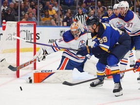 Stuart Skinner #74 of the Edmonton Oilers makes a save against Pavel Buchnevich #89 of the St. Louis Blues during the first period at Enterprise Center on April 1, 2024 in St Louis, Missouri.