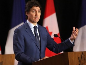 Prime Minister Justin Trudeau speaks at the Sir John A. Macdonald building in Ottawa on April 11, 2024.