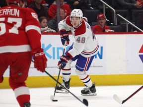 Canadiens' Lane Hutson skates with the puck in the first period of his NHL debut at Little Caesars Arena in Detroit on Monday night.