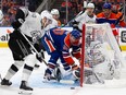 Corey Perry #90 of the Edmonton Oilers battles against goaltender Cam Talbot #39 of the Los Angeles Kings during the second period in Game Two of the First Round of the 2024 Stanley Cup Playoffs at Rogers Place on April 24, 2024.