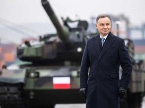 Polish President Andrzej Duda attends the acceptance of the first South Korean K2 battle tanks and South Korean K9 howitzers for Poland in Dec. 6, 2022 at the Baltic Container Terminal in Gdynia.
