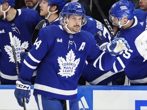 Toronto Maple Leafs' Auston Matthews (34) celebrates his goal against the Pittsburgh Penguins during third period in Toronto on Monday.