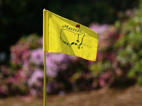 The flag on the 13th hole flutters in the breeze during a practice round in preparation for the Masters golf tournament at Augusta National Golf Club Wednesday, April 10, 2024, in Augusta, GA.
