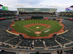 The Oakland Athletics play the Texas Rangers at a nearly empty RingCentral Coliseum on May 26, 2022 in Oakland, California.