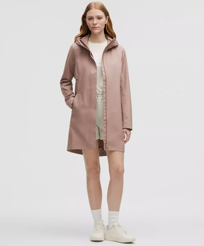 model wears pink lululemon Rain Rebel Jacket