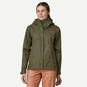 model wears green patagonia Women's Torrentshell 3L Rain Jacket