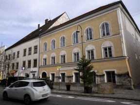A car passes Adolf Hitler's birth house in Braunau, Austria, Thursday, Nov. 16, 2023.