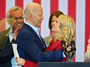 U.S. President Joe Biden speaks with Kerry Kennedy during a campaign event at Martin Luther King Recreation Center on April 18, 2024 in Philadelphia.