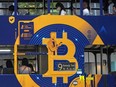 An advertisement for the cryptocurrency bitcoin displayed on a tram, May 12, 2021, in Hong Kong.