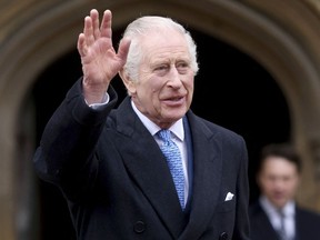 FILE - Britain's King Charles III waves as he leaves after attending the Easter Matins Service at St. George's Chapel, Windsor Castle, England, March 31, 2024. Buckingham Palace says King Charles III will resume his public duties next week following treatment for cancer. The announcement on Friday April 26, 2024, comes almost three months after Charles took a break from public appearances to focus on his treatment for an undisclosed type of cancer.