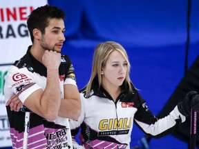 Canada's Colton and Kadriana Lott remained undefeated at the world mixed doubles curling championship with a 6-4 win over South Korea on Monday. Lott and Lott discuss strategy while playing Team Einarson/Gushue during the Canadian Mixed Doubles Curling Championship final in Calgary, Alta., Thursday, March 25, 2021.