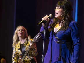 Ann Wilson, right, and her sister Nancy of the band Heart perform at the Bell Centre in Montreal on Tuesday July 16, 2019.