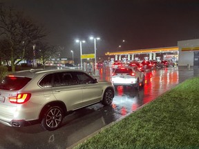 Drivers line up for gas before an expected double-digit price hike on Wednesday, April 17, 2024. JOE WARMINGTON/TORONOT SUN