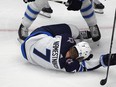 Winnipeg Jets center Vladislav Namestnikov (7) falls to the ice after taking a slap shot to the face in the third period of Game 4 of an NHL Stanley Cup first-round playoff series against the Colorado Avalanche, Sunday, April 28, 2024, in Denver.