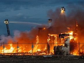 A large fire broke out Monday night at the municipal airport destroying the wood-framed Hangar 11 which was between NAIT campus and the Blatchford neighbourhood on Monday, April 22, 2024 in Edmonton.