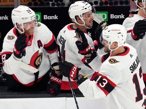 Ottawa Senators left-winger Jiri Smejkal is congratulated after scoring his first NHL goal against the Boston Bruins during the second period on Tuesday night.