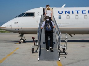 Passengers board a United Airlines plane in Sheridan, Wyoming.
