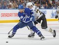 Maple Leafs' William Nylander breaks past Jake DeBrusk of the Boston Bruins during the first period at Scotiabank Arena on March 4, 2024 in Toronto.