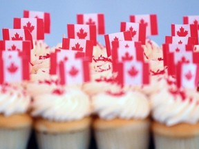 Cupcakes with Canadian flags are served during an official Canadian citizenship ceremony.